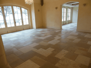 A room with tile floors and windows in it