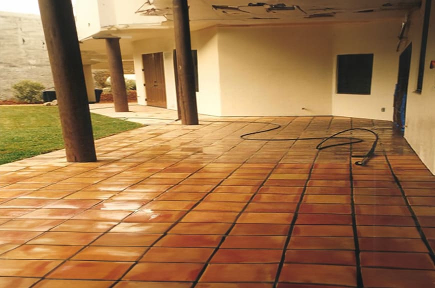 A large room with a lot of tile on the floor