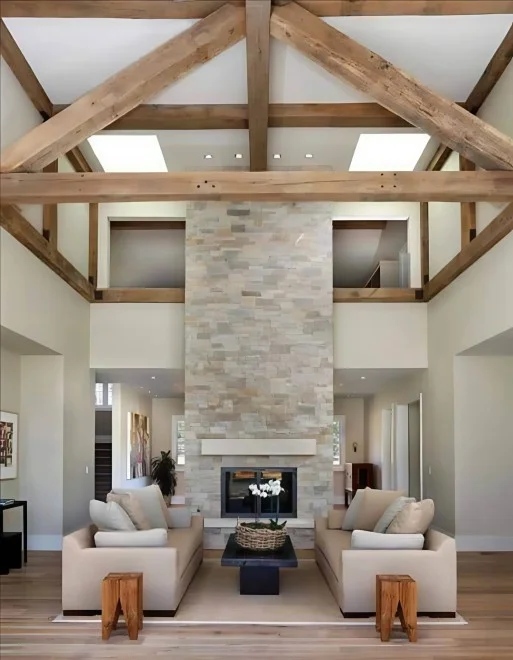 HomePageFireplaceLivingRoom-1593x2048 (1) (1) A living room with two couches and a fireplace.